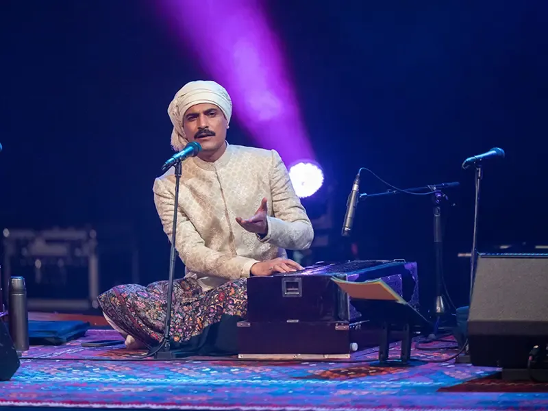 Sufi qawwali with cultural scholar