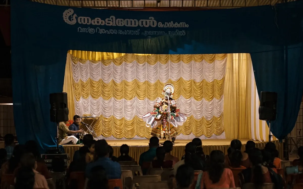 Kathakali dancer with traditional face paint