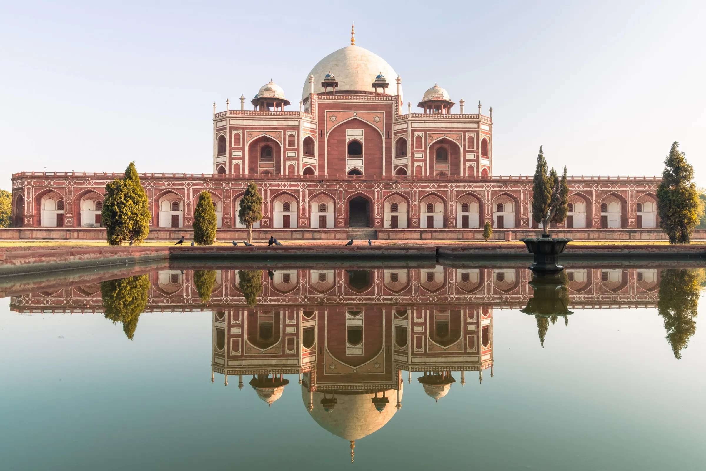 Humayun's Tomb in Delhi mirrored in a still reflecting pool