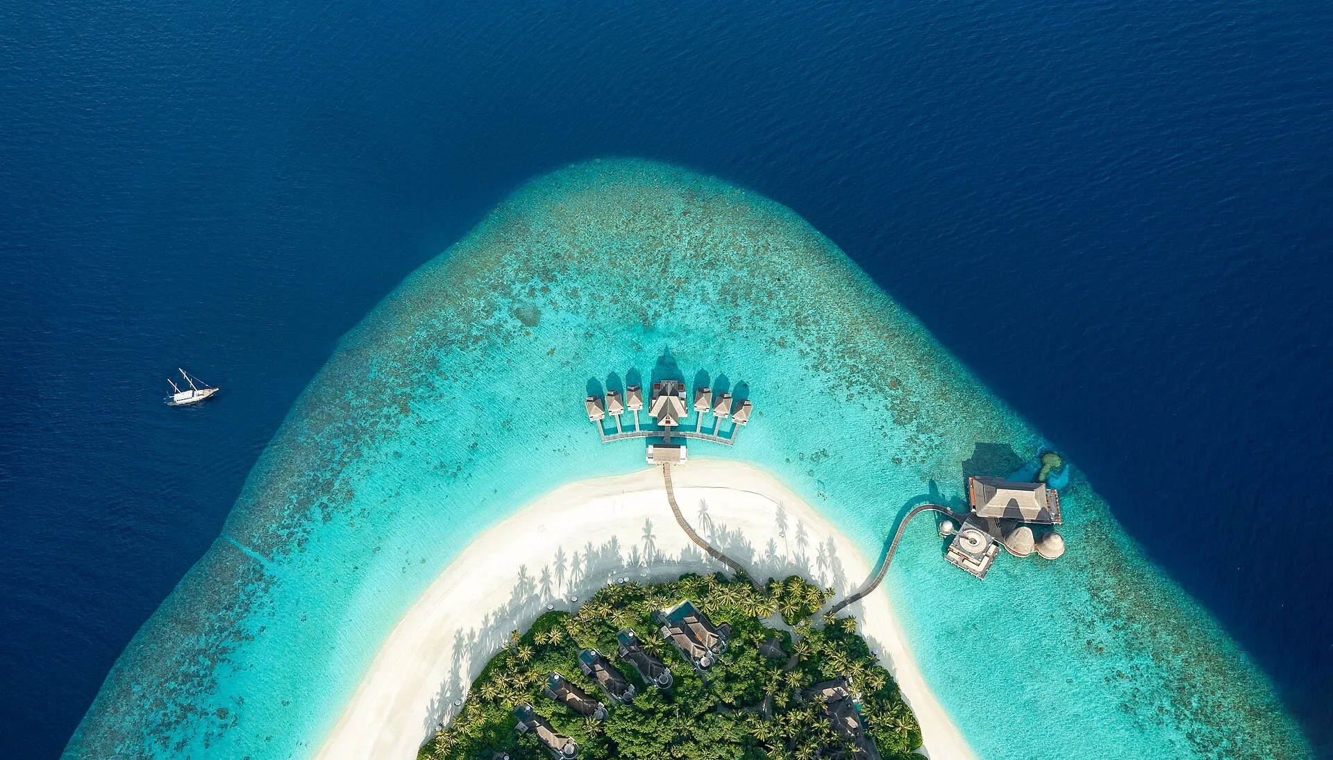 A private island resort surrounded by clear water