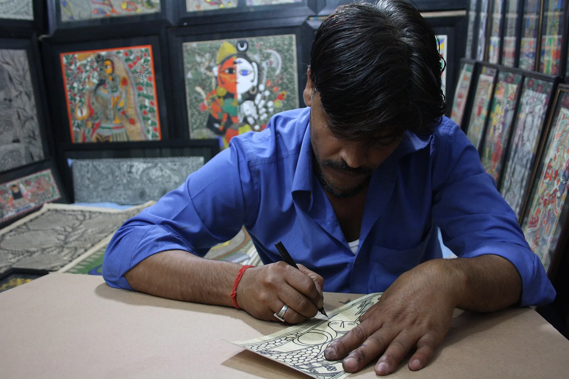 A vivid Madhubani (Mithila) folk painting on display