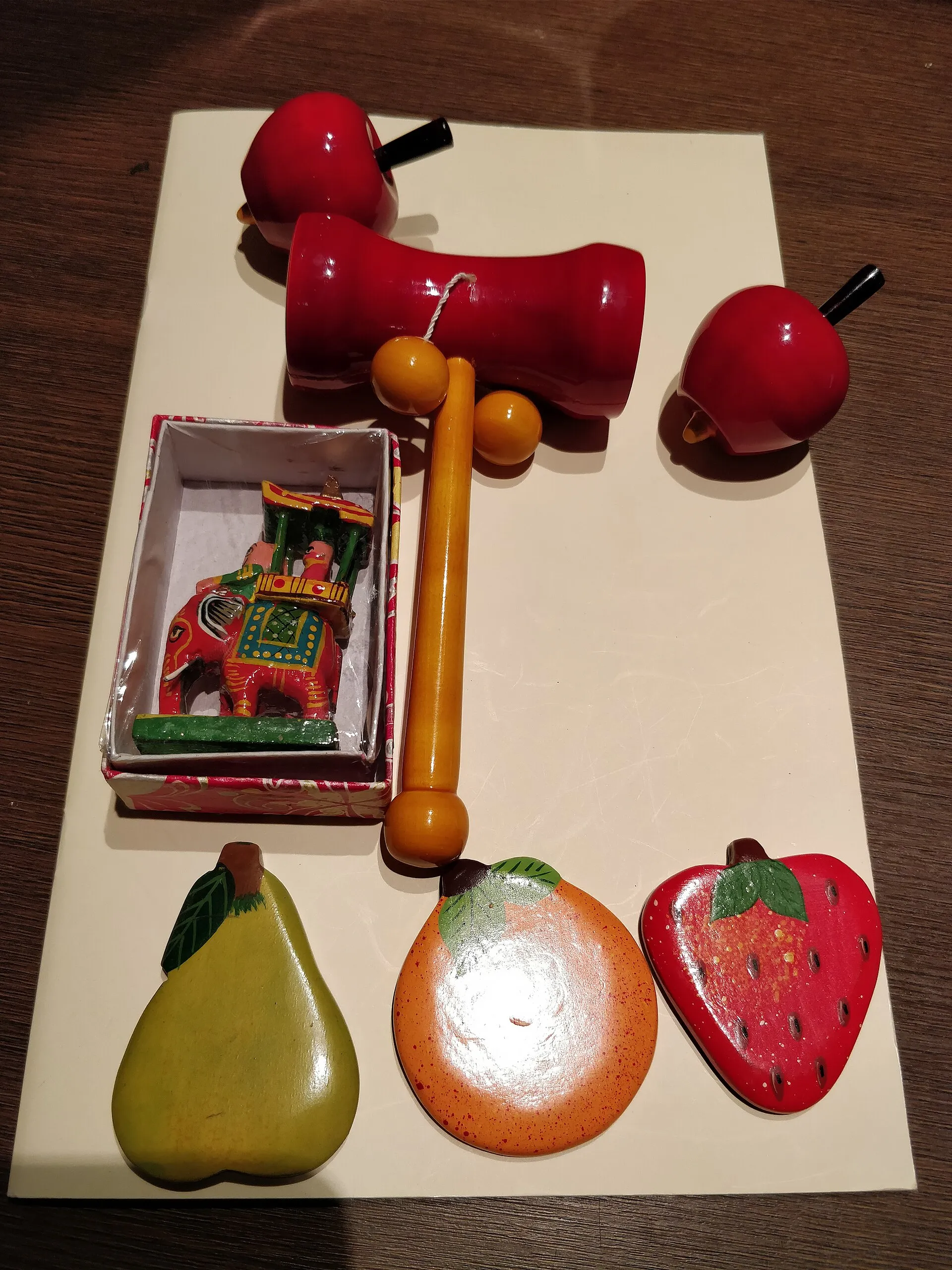 Brightly lacquered Channapatna wooden toys and objects